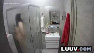 LUUV. A brunette showers, used to amateur cameras, showing her natural body