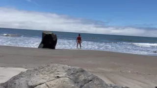 Nude rocky beach swim ocean