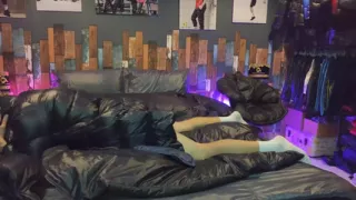 Cock Rubbing Down Jacket on Shiny Nylon Bed