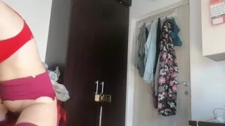 Sexy Latina Having Fun Trying on Clothes and Cutting Them