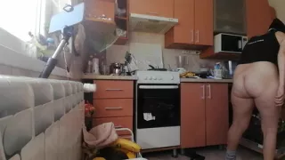 Sexy mom makes breakfast, hairy pussy, big tits. Sexy woman clears out the house, hairy, big ass.