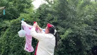 In an outfit with a new blouse on which I've modified the ascot tie to hang my laundry.