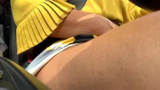 Mature woman rubs her pussy and masturbates in the car in traffic and has an orgasm