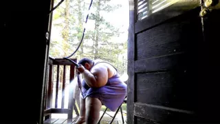 Showering in the water hose. pt 2