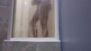 I take a nice bath at the hotel while I wait to relax.