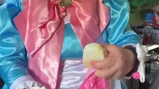 In a blue maid's outfit with pink bows to do the laundry.