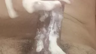 hot boy uses soap on his big cock and big balls stroking his full length and having big orgasm