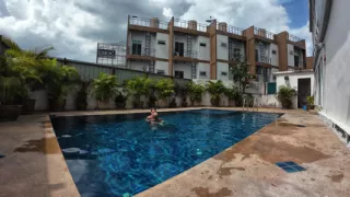 watch us playing in our swimming pool