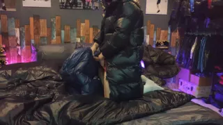 Cock Rubbing Down Jacket on Shiny Nylon Bed