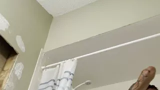 In the shower, ready to go to work