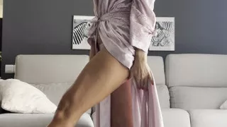 German milf puts on a striptease while her husband is not home