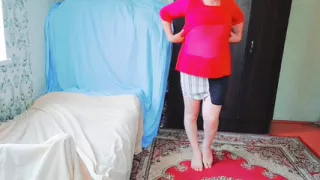 Sweet shemale posing in lace robe on soft bed