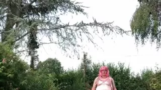 In an outfit with a pink dress for an evening out