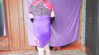 Lovely trans beauty tying up hair with ribbon