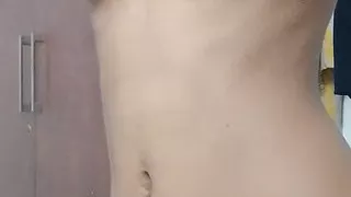 Babe stripping and playing with pussy