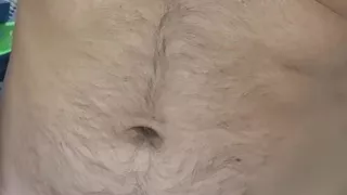 Trimming the fur of the naughty and furry teddy bear