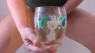 Desperate piss in a wine glass