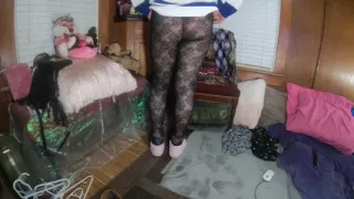 Cute t-girl teasing in lacy tights with socks and hockey jersey