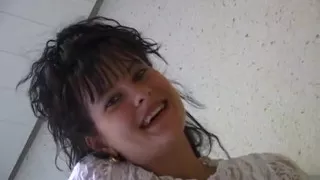 Small titted brunette babe is rubbing her hairy snatch