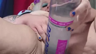 Big Bottle Plugged Clit Cunt