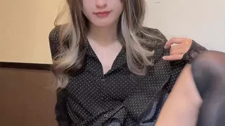 Video of a cross-dresser masturbating quietly