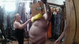 Part 2:-Satana and Mistress Carrie with slave for a sensory deprivation box