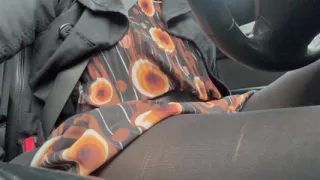 Elegant stepmom drives to the office wearing tights and a beautiful dress