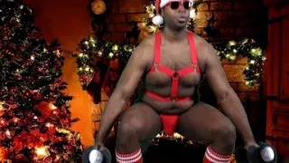 Sexy black Santa works out before jerking his big stocking stuffer