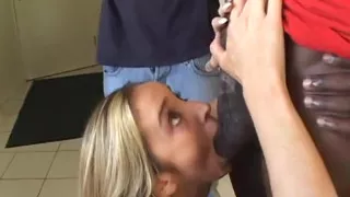 Blonde lady wearing high heels gets double penetrated in interracial threesome
