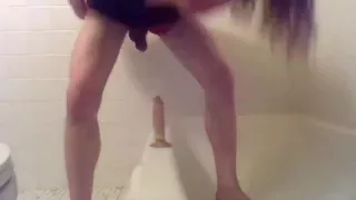 Lil Taste in the bathroom