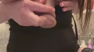 Young stepmom with big tits fucks a dildo in the bathroom