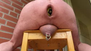 Balls in the ass on the balcony