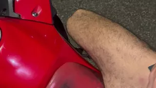 Big, beautiful penis of a Brazilian model on a motorcycle without underwear, showing it off in public.