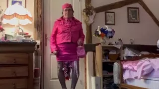 Dressed in a fuchsia miniskirt for her flight attendant party