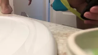 Stretching Shaved Ass with Black Butt Plug in Jock Strap