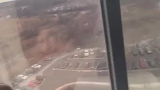 Giving Backshots While Looking Out of 12th Story Hotel