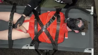 Bondage Twink Strapped to Campbed in Straitjacket and Gas Mask