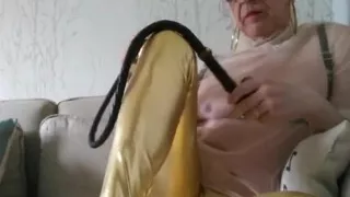 Whore in Leggings with a Whip