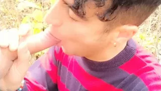 Taking friends cum on face in the park - sucking cock outdoor