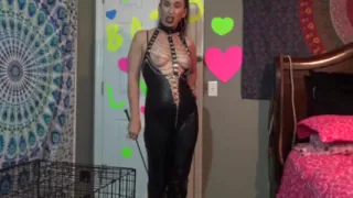 Solo mistress wearing latex shows her tits while talking dirty