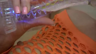 Hot teen in fishnet plays with her vibrator