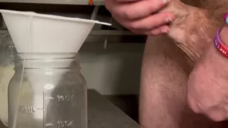 Hung Cum God Pumps a Jar Full of His Sperm