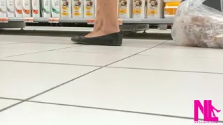 Footplay and Dipping in Black Flats at a Conad Store