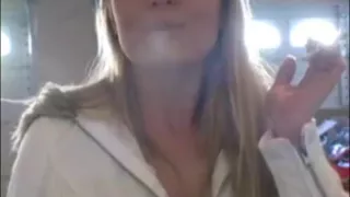 Slutty teens smoking a cigarettes in close up video