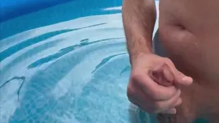 Outdoor Poolside Attraction with Closeup Cumshot