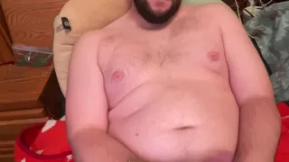 Chubby boy jerks off in bed