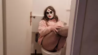 Young trans woman jerks off in the toilet