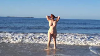 Real nudist Playing Naked in the Ocean Waves