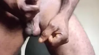 Masturbating