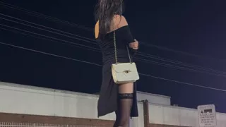Asian cross dresser hooker plays with ass on a public street